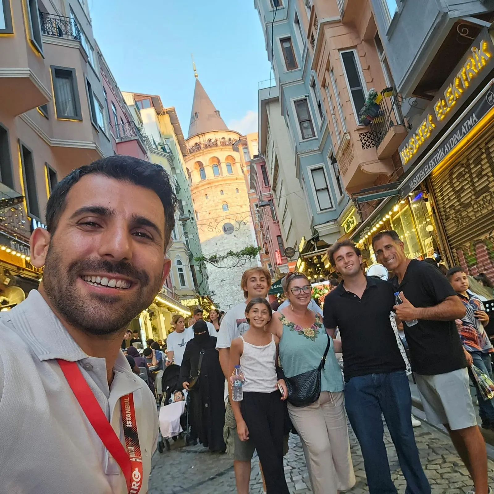 Real guests with their local guide in front of Galata Tower during a private Istanbul walking tour