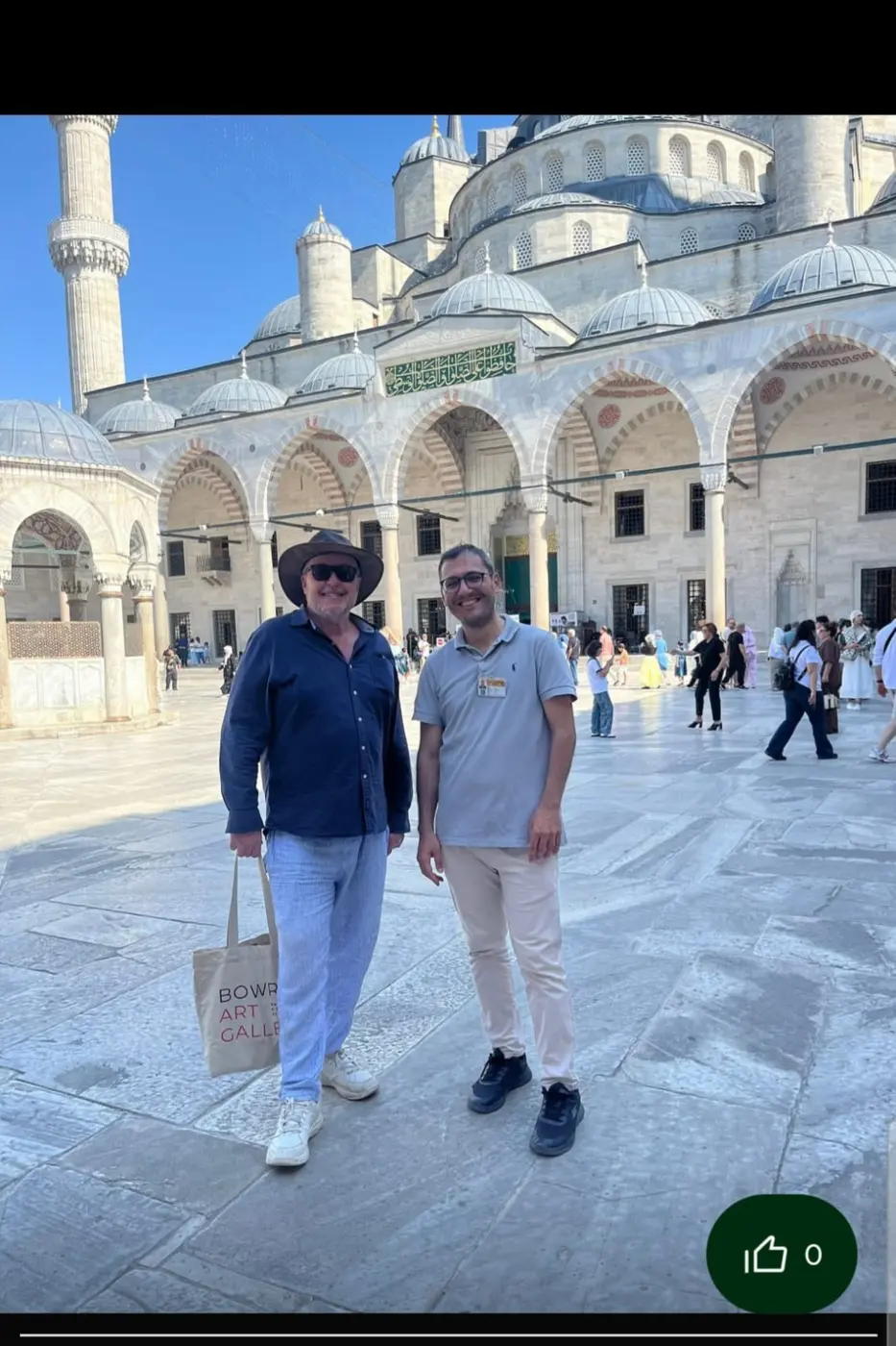 Ruhi with a guest at the Blue Mosque in Istanbul