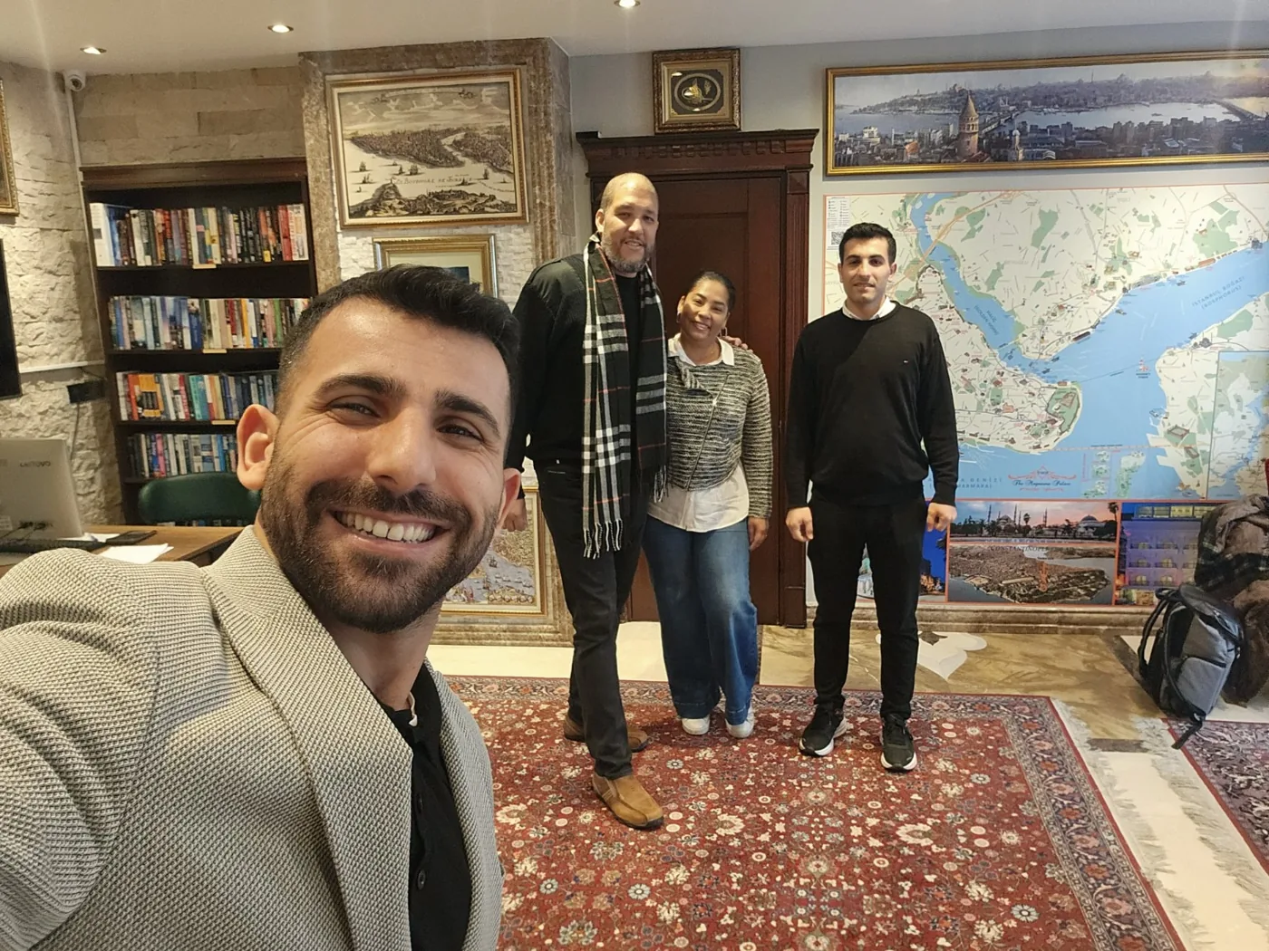 Aydin and guests learning about Turkish carpets and craftsmanship